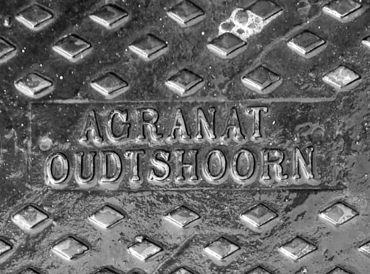 An Agranat drain cover, still in the street