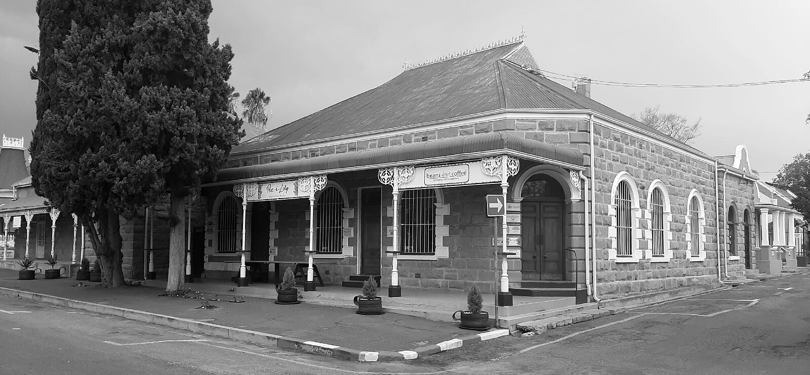 The bank on the corner, its main door set to face both streets