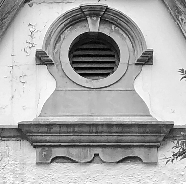 A moulded vent set into the gable